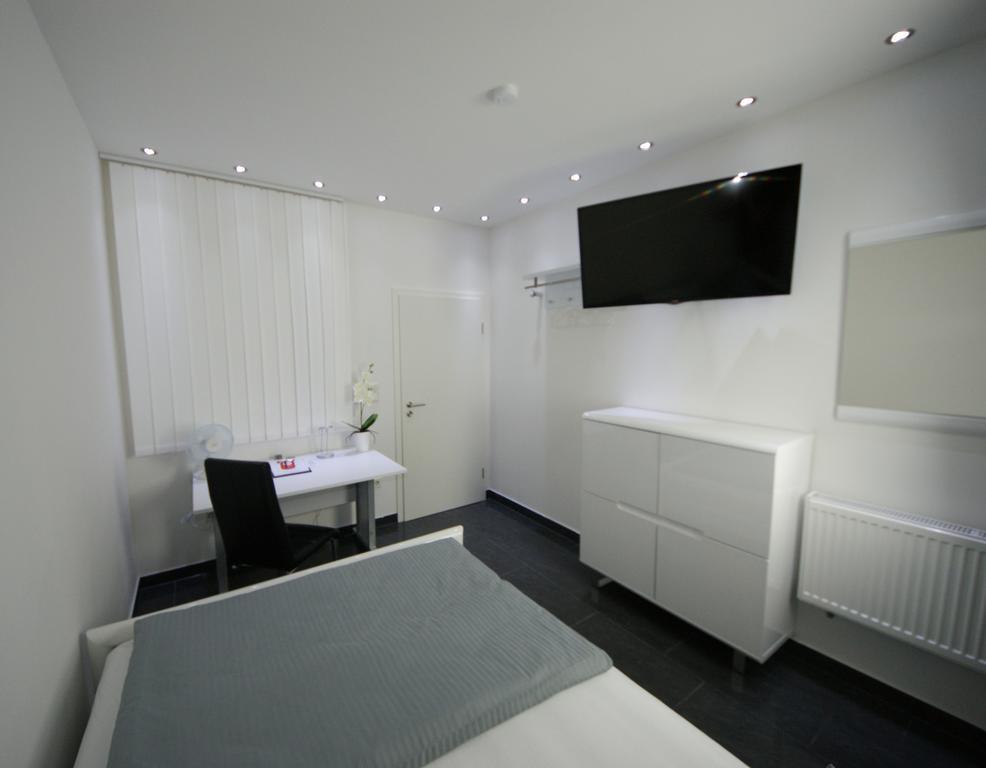 Hotel Am Rosenplatz,24 Stunden Check In, Kostenfreie Parkplaetze Brechtorf Pokoj fotografie
